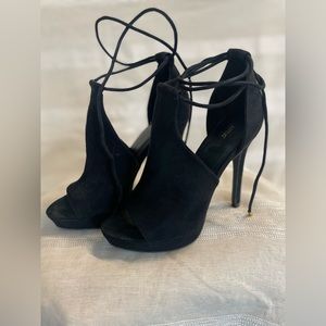 Black open toe heels with laces at the ankle